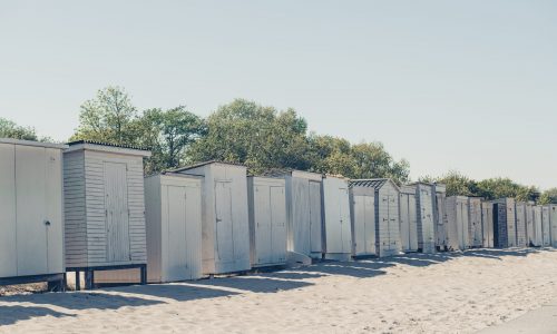 Changing rooms on the sandy beach.